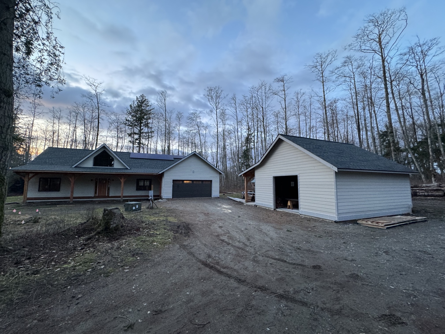 Modern custom home with panel siding and trim details